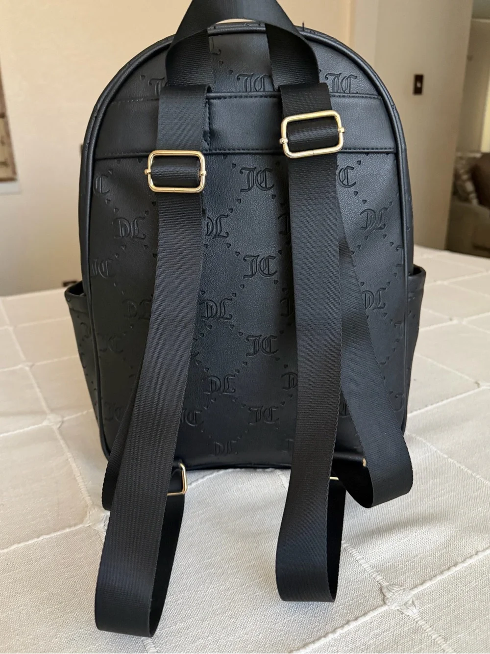 Juicy Couture Black Embossed Logo Backpack with Gold Hardware